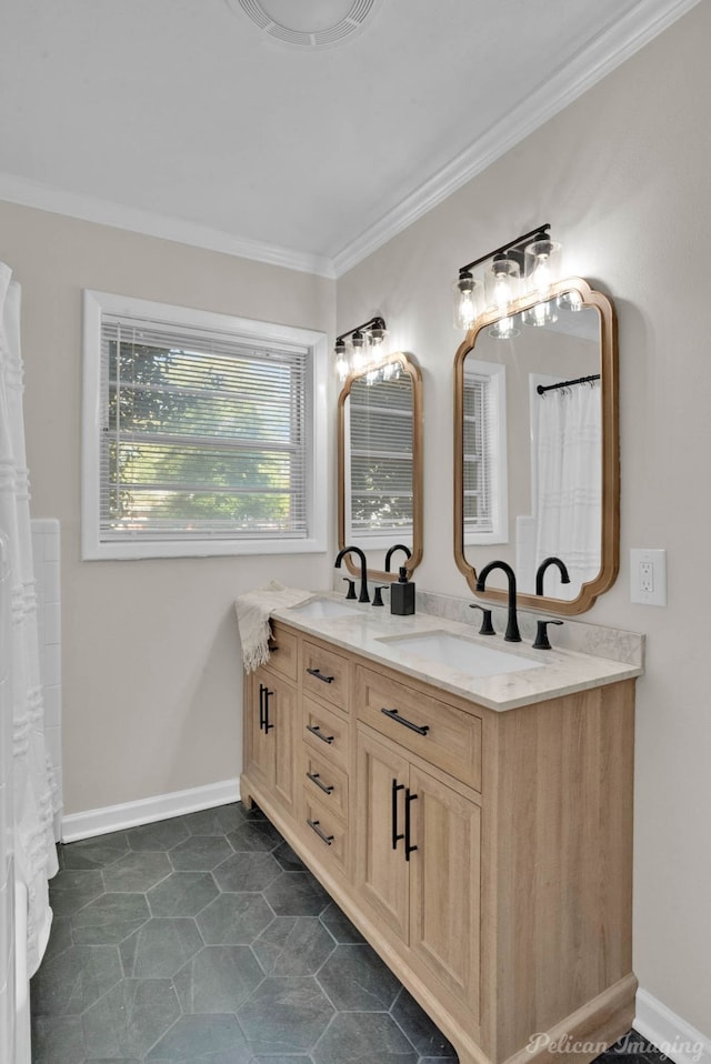 bathroom with vanity and ornamental molding