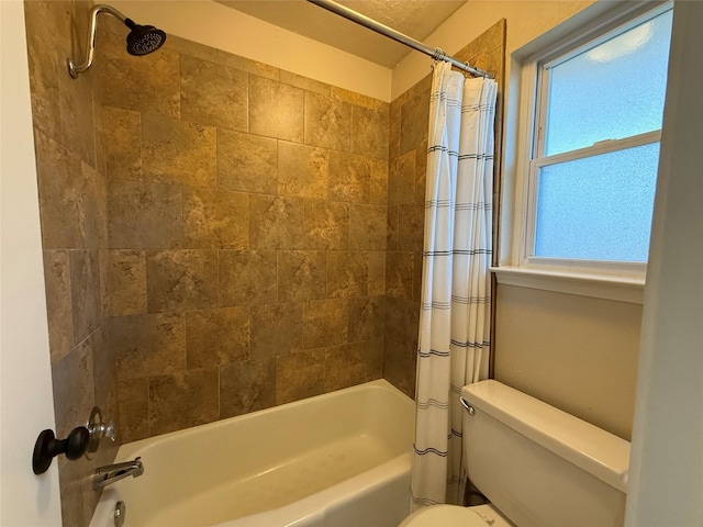 bathroom with toilet and shower / bathtub combination with curtain