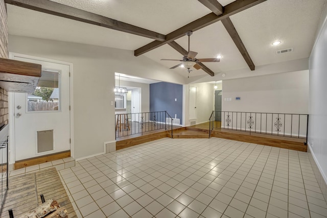 unfurnished room with lofted ceiling with beams, light tile patterned floors, a textured ceiling, and ceiling fan