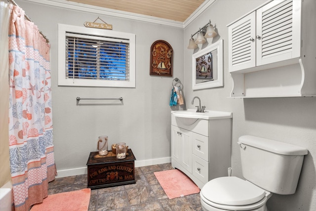 bathroom with vanity, crown molding, and toilet