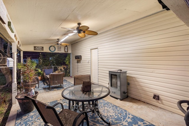 view of patio featuring ceiling fan