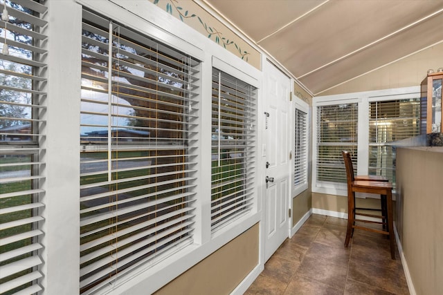 doorway with vaulted ceiling