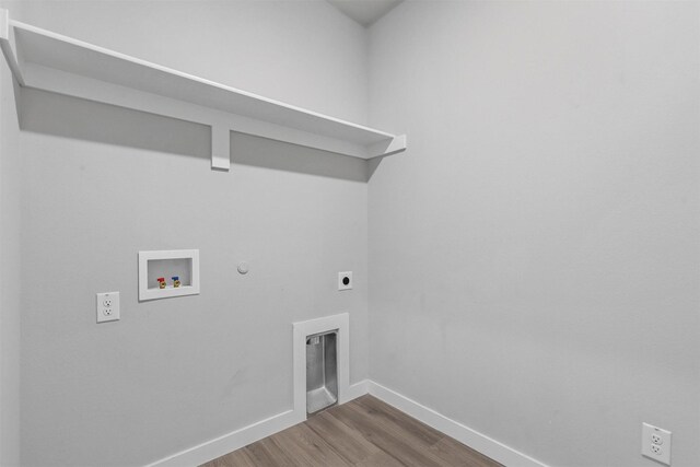 laundry room with hookup for an electric dryer, washer hookup, hardwood / wood-style flooring, and gas dryer hookup