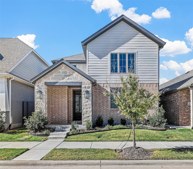 view of front of home with a front yard