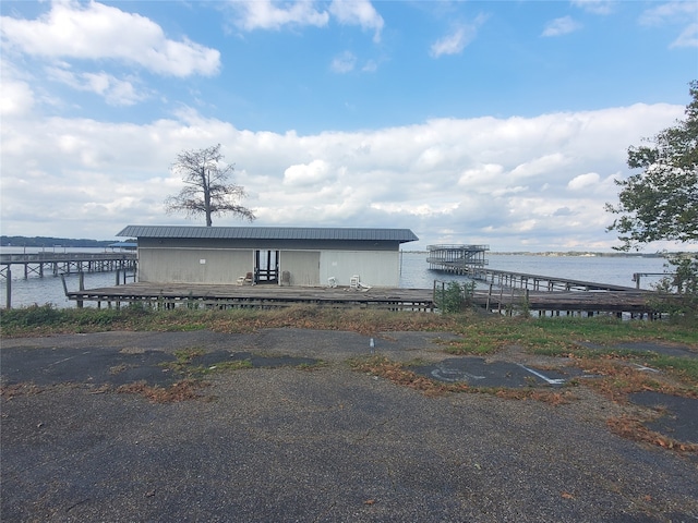 dock area featuring a water view