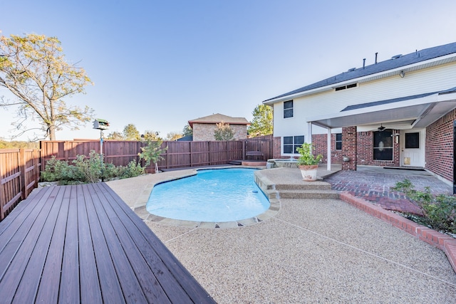 view of pool featuring a patio area and ceiling fan