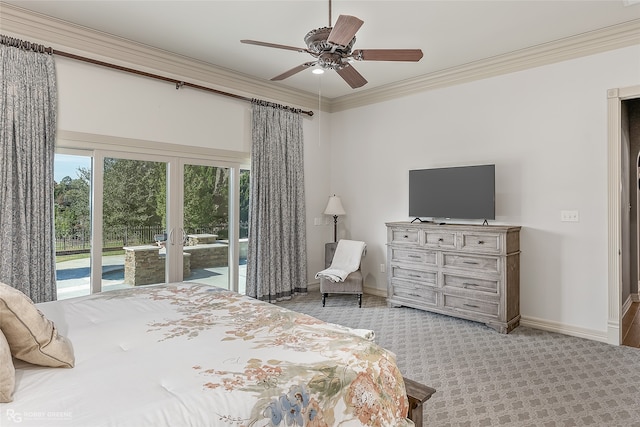 carpeted bedroom with ceiling fan, access to exterior, and crown molding