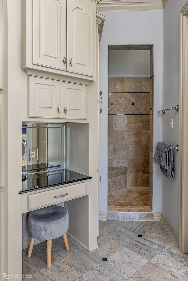 bathroom with tiled shower