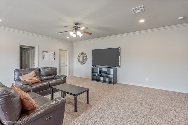 living room featuring light carpet, ceiling fan, and ornamental molding