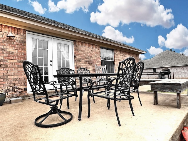 view of patio / terrace featuring french doors