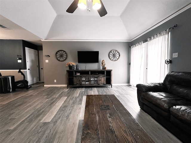 living room with hardwood / wood-style flooring, vaulted ceiling, and ceiling fan