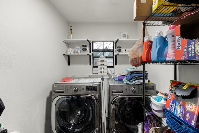 washroom with independent washer and dryer