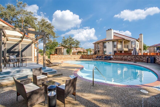 view of pool with a patio