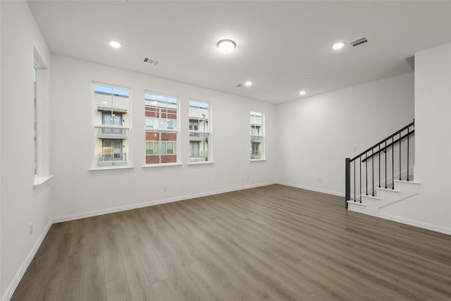 spare room featuring hardwood / wood-style floors