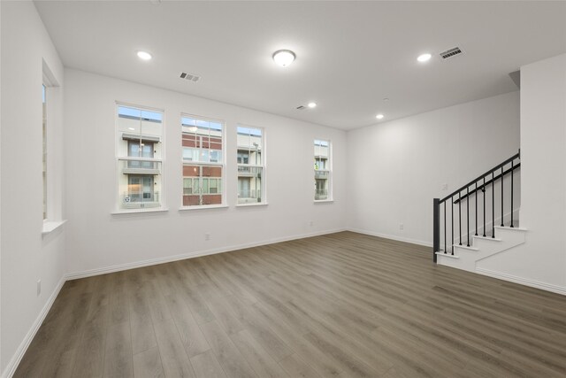 spare room featuring hardwood / wood-style floors