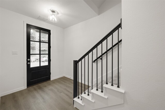 foyer with light hardwood / wood-style flooring