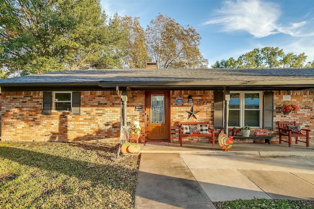 property entrance with a porch