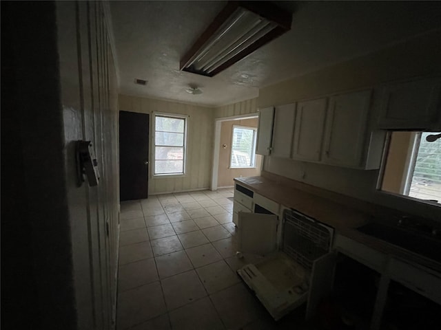 kitchen with light tile patterned floors