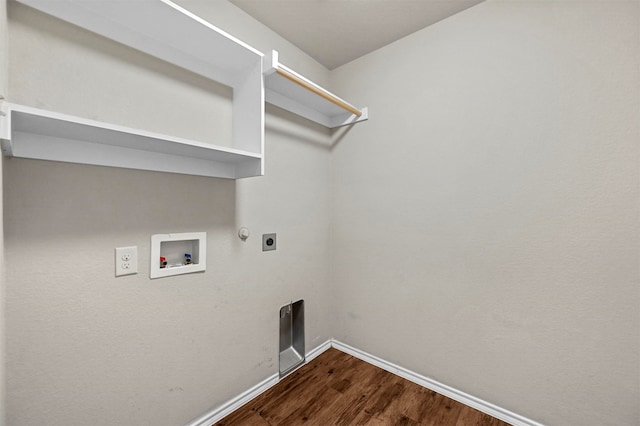 laundry room featuring hardwood / wood-style floors, hookup for a gas dryer, hookup for a washing machine, and electric dryer hookup