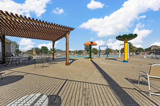 view of play area featuring a pergola