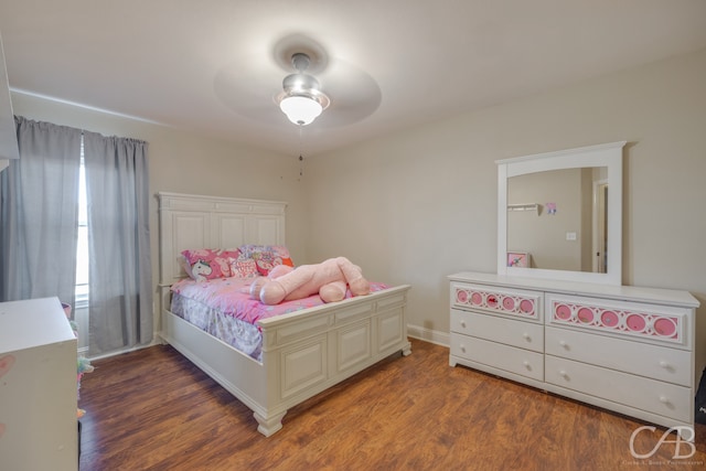 bedroom featuring ceiling fan and dark hardwood / wood-style flooring