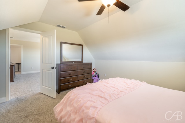 carpeted bedroom featuring ceiling fan and lofted ceiling