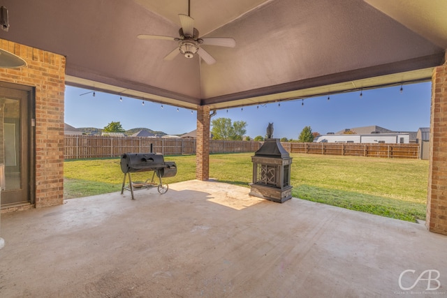 view of patio / terrace featuring area for grilling and ceiling fan