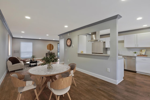 dining space with dark hardwood / wood-style floors and crown molding