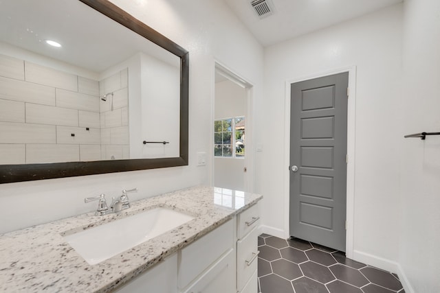 bathroom featuring vanity and tile patterned floors