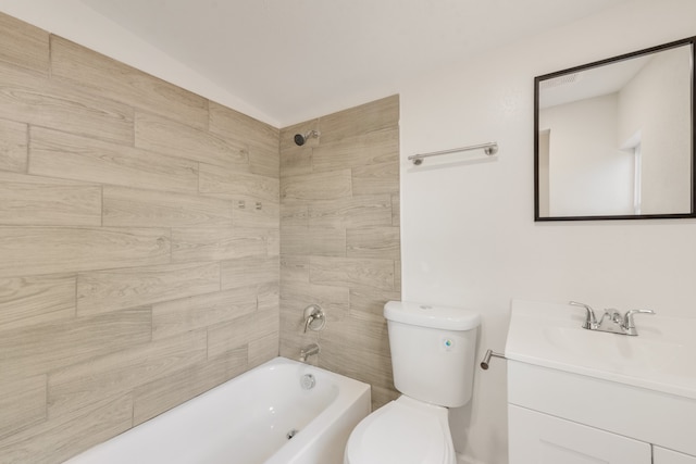 full bathroom featuring vanity, toilet, and tiled shower / bath