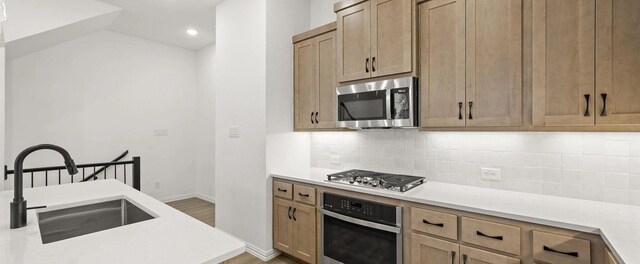 bathroom featuring vanity and a shower with door