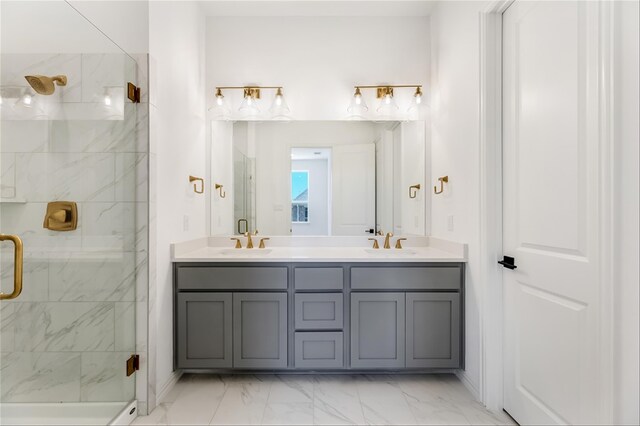 bathroom featuring vanity and a shower with door