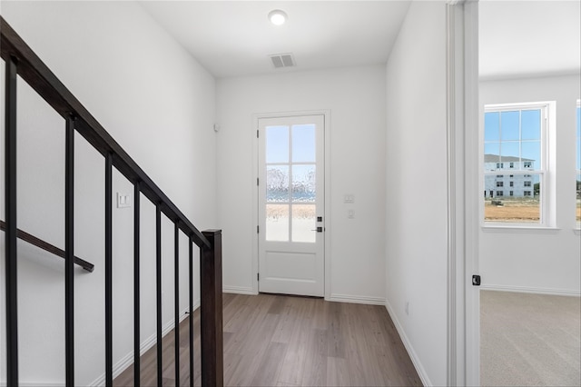 foyer entrance featuring light hardwood / wood-style flooring