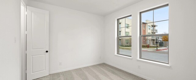 unfurnished living room with ceiling fan and light hardwood / wood-style floors