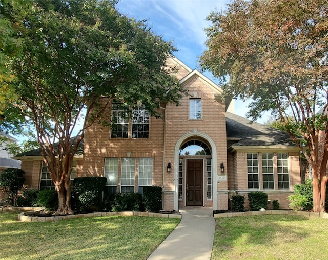 view of front of home with a front yard