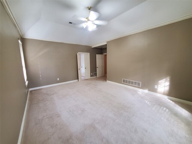 interior space with ceiling fan, carpet floors, and crown molding