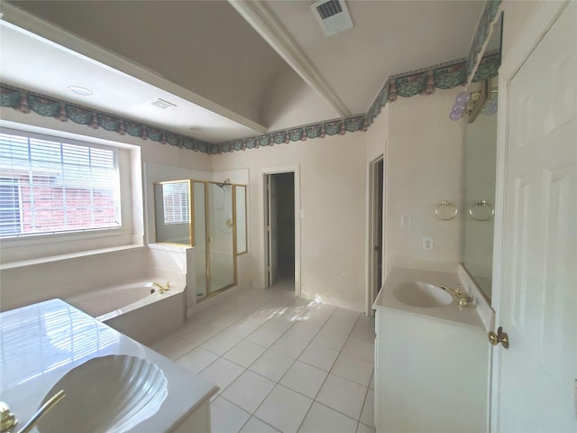 bathroom with plus walk in shower, vanity, and tile patterned flooring