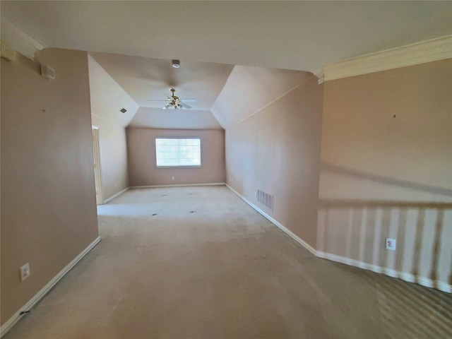 bonus room with ceiling fan, light colored carpet, and lofted ceiling