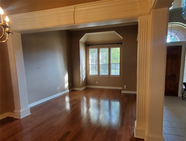 unfurnished room featuring dark hardwood / wood-style flooring