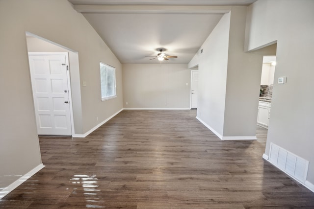 interior space featuring ceiling fan, dark hardwood / wood-style flooring, and lofted ceiling