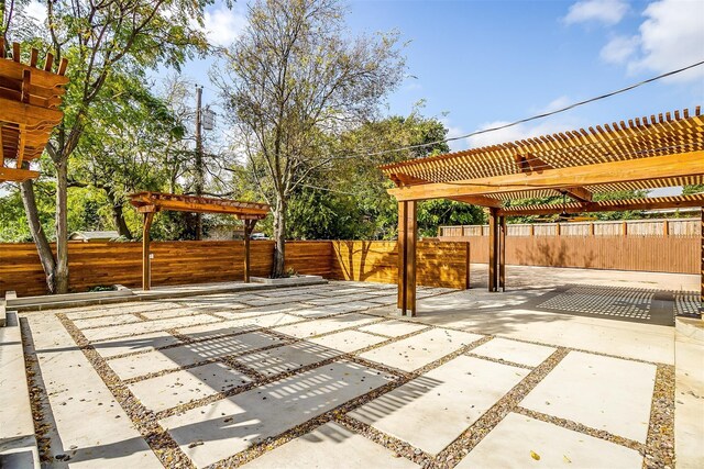 view of patio featuring a pergola