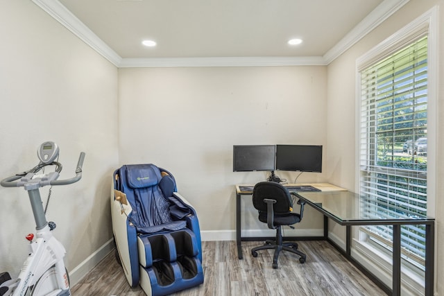 home office featuring hardwood / wood-style flooring and ornamental molding