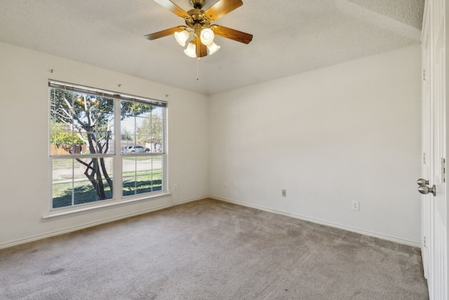 1306 Woodmont Dr, Allen, TX 75002 - empty room with carpet, ceiling fan, baseboards, and a textured ceiling