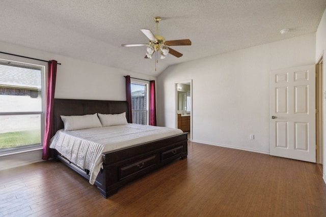 1306 Woodmont Dr, Allen, TX 75002 - bedroom featuring vaulted ceiling, baseboards, wood finished floors, ceiling fan, and a textured ceiling