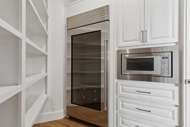 pantry with wine cooler