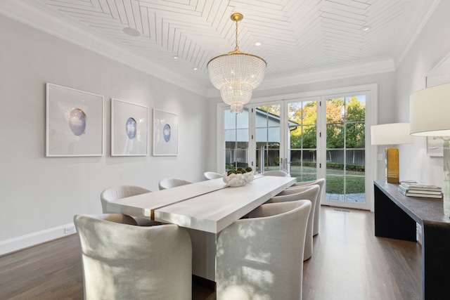 dining room with crown molding, french doors, a chandelier, and hardwood / wood-style flooring