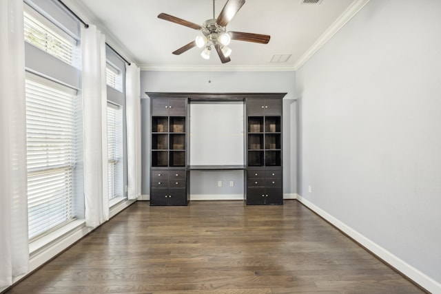 interior space with crown molding, ceiling fan, and dark wood-type flooring