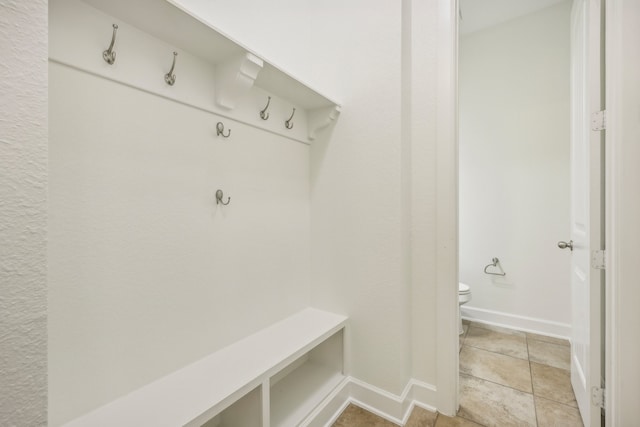 mudroom featuring light tile patterned floors