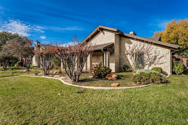 view of property exterior with a yard