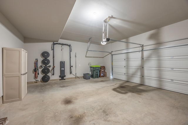 garage featuring a garage door opener